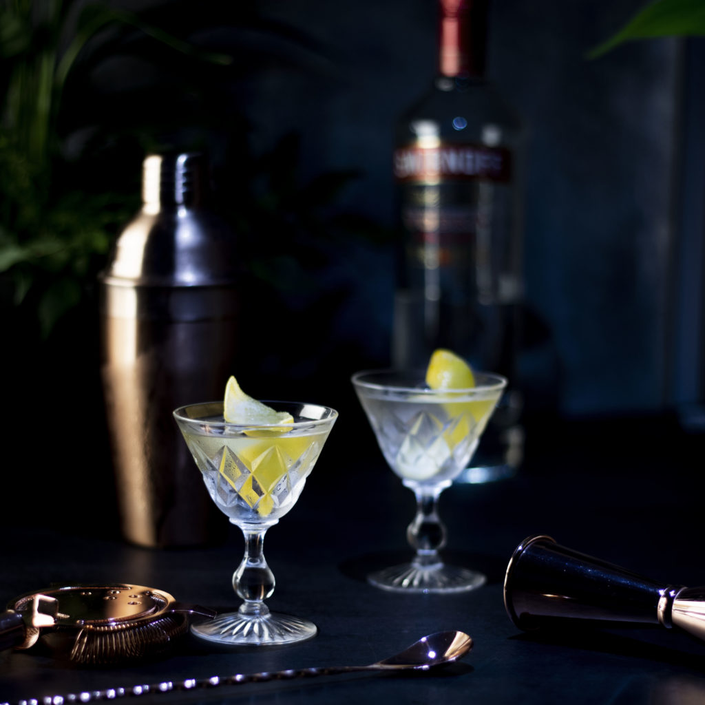 Smirnoff Vodka Martini served in vintage glasses imitating the serve drunk by Bond in No Time to Die